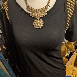 Woman's black and gold studded Dress tee